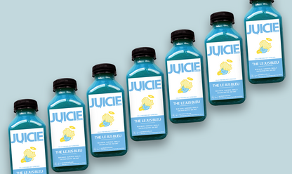 12oz bottles of cold pressed protein almond milk blend containing vanilla, coconut nectar, sea salt, and blue majik. JUICIE Detroit