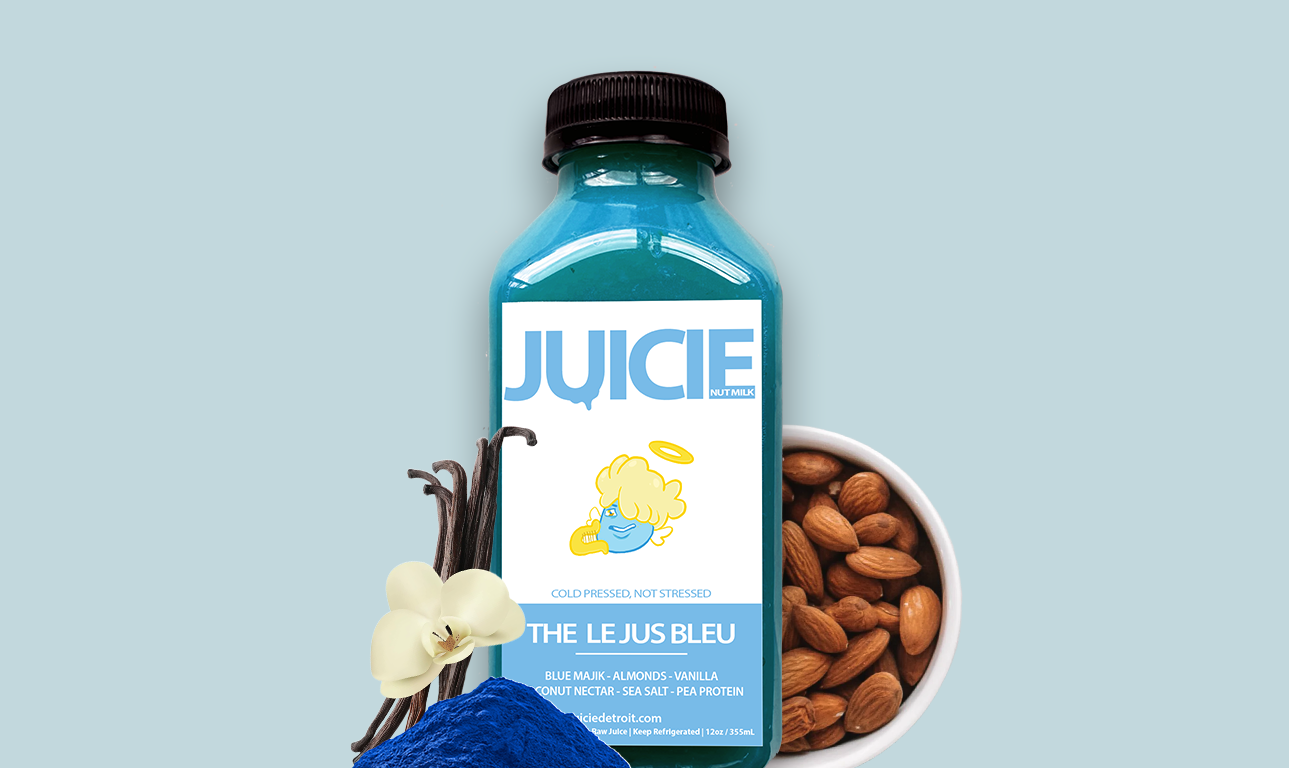 12oz bottle of cold pressed protein almond milk blend containing vanilla, coconut nectar, sea salt, and blue majik. JUICIE Detroit