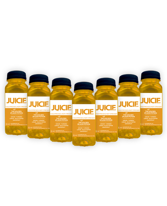 2oz bottles of cold pressed immunity juice blend shots containing ginger, turmeric, lemon, black pepper, and grapefruit. JUICIE Detroit