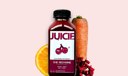 12oz bottle of cold pressed root juice blend containing orange, carrot, beet, and cherry. JUICIE Detroit